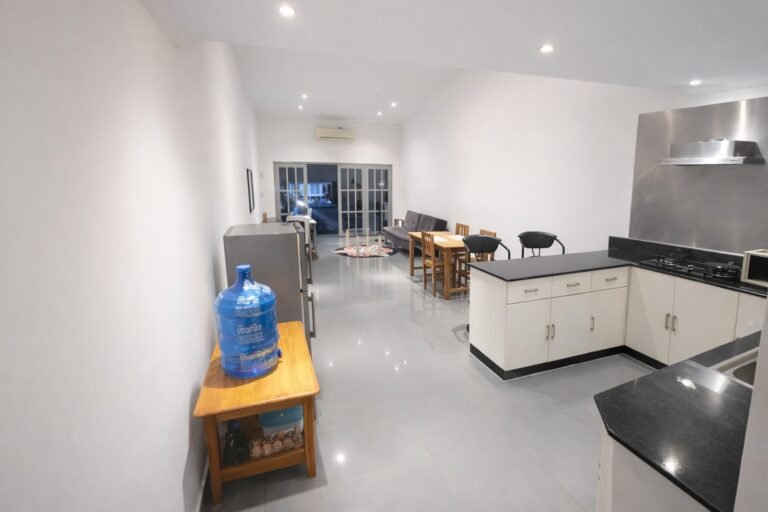 View of Kitchen - Living Space - Balcony Glass Doorway